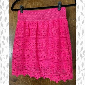 Pink lace mini skirt